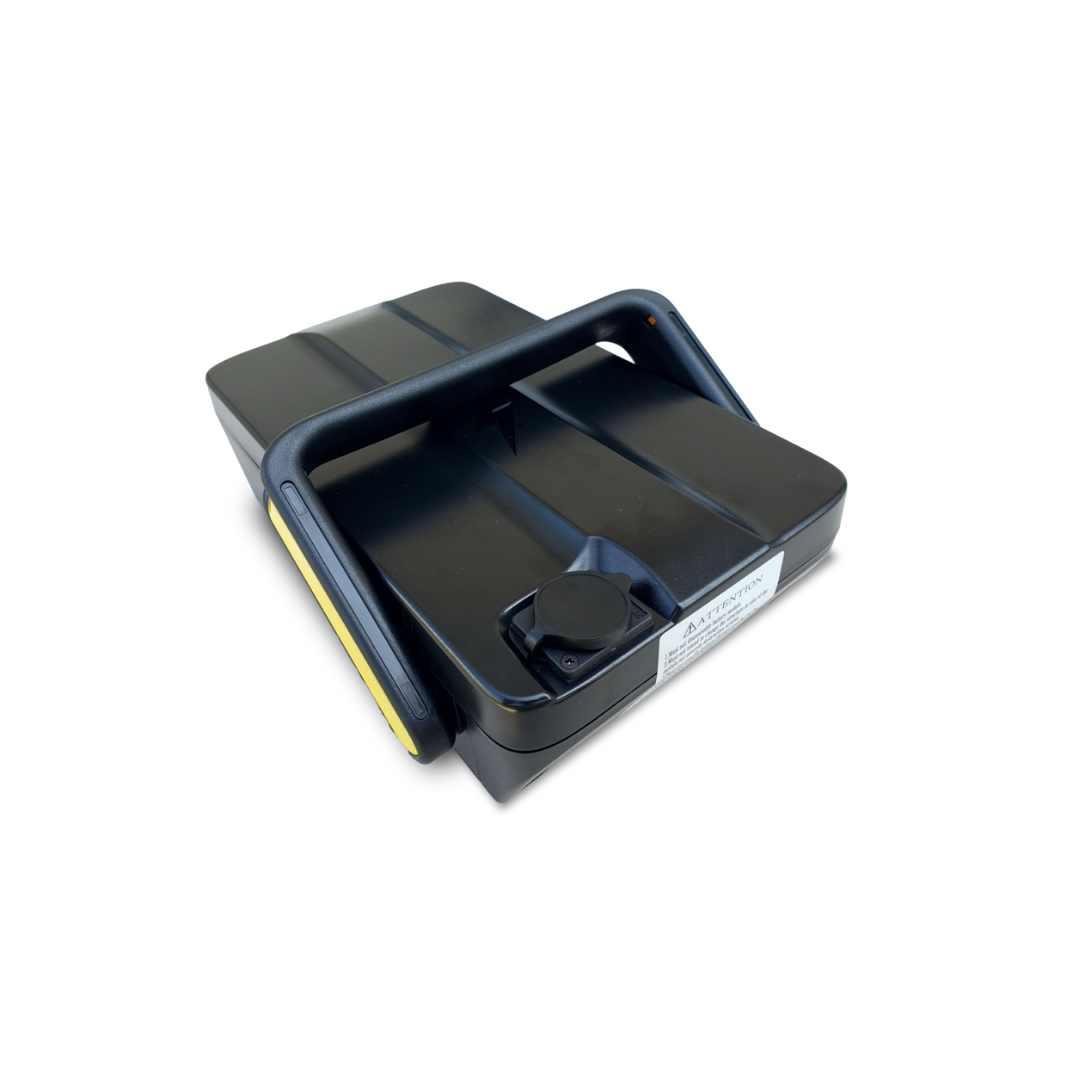 A black, rectangular plastic parking lock with a handle and dial on top, plus a yellow strip, secures your EV Rider Gypsy Ultra Compact Airline Approved Scooter; shown on a white background.