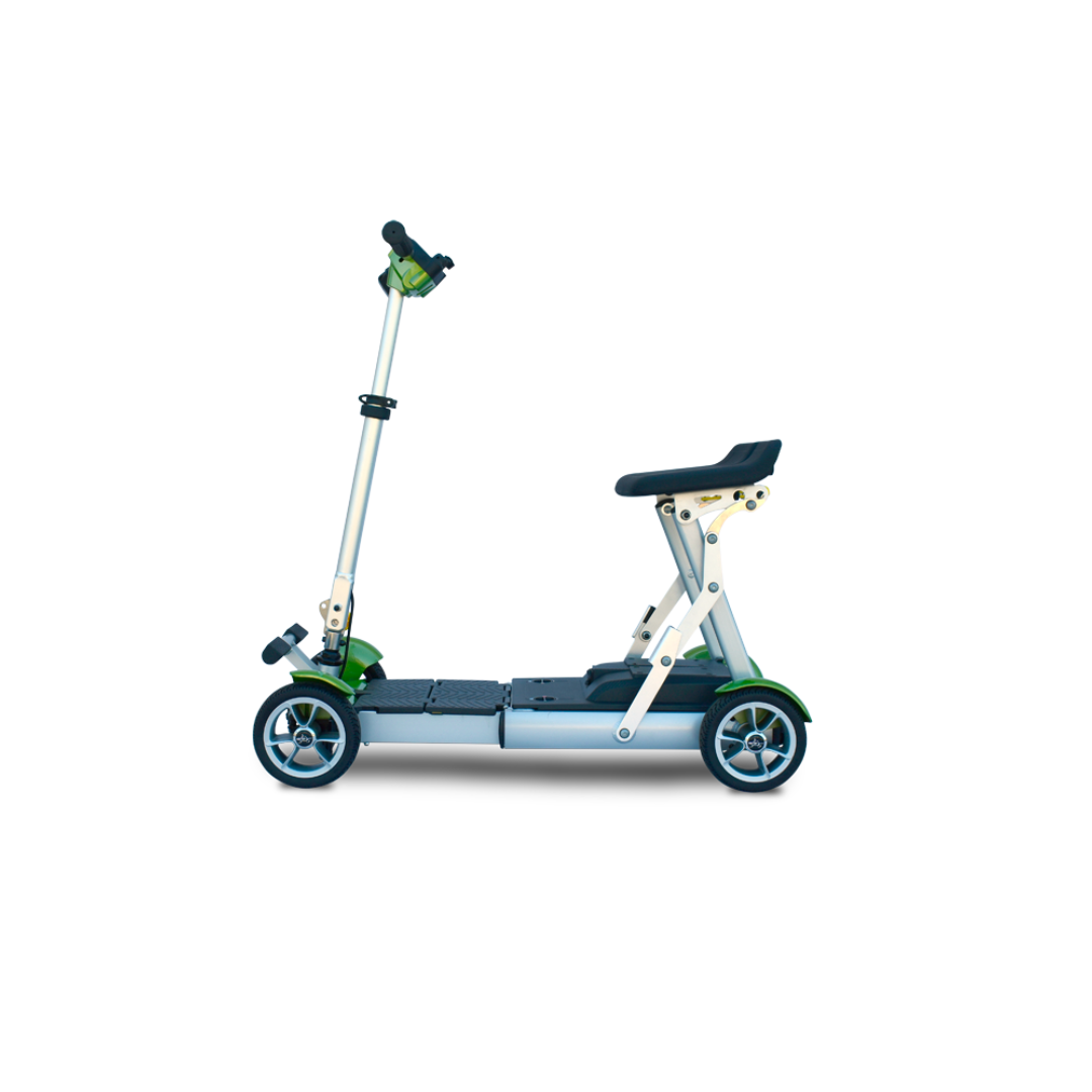 The EV Rider Gypsy Ultra Compact Airline Approved Scooter is a foldable, three-wheeled travel scooter with a seat, shown in profile on a white background. It features a sleek silver and green frame with black accents for a modern look.