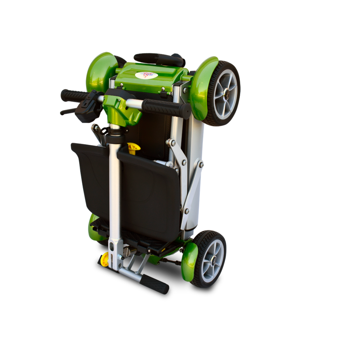 The EV Rider Gypsy Ultra Compact Airline Approved Scooter, shown upright for storage on a white background, features a green folding frame, black handles and seat, and four wheels.