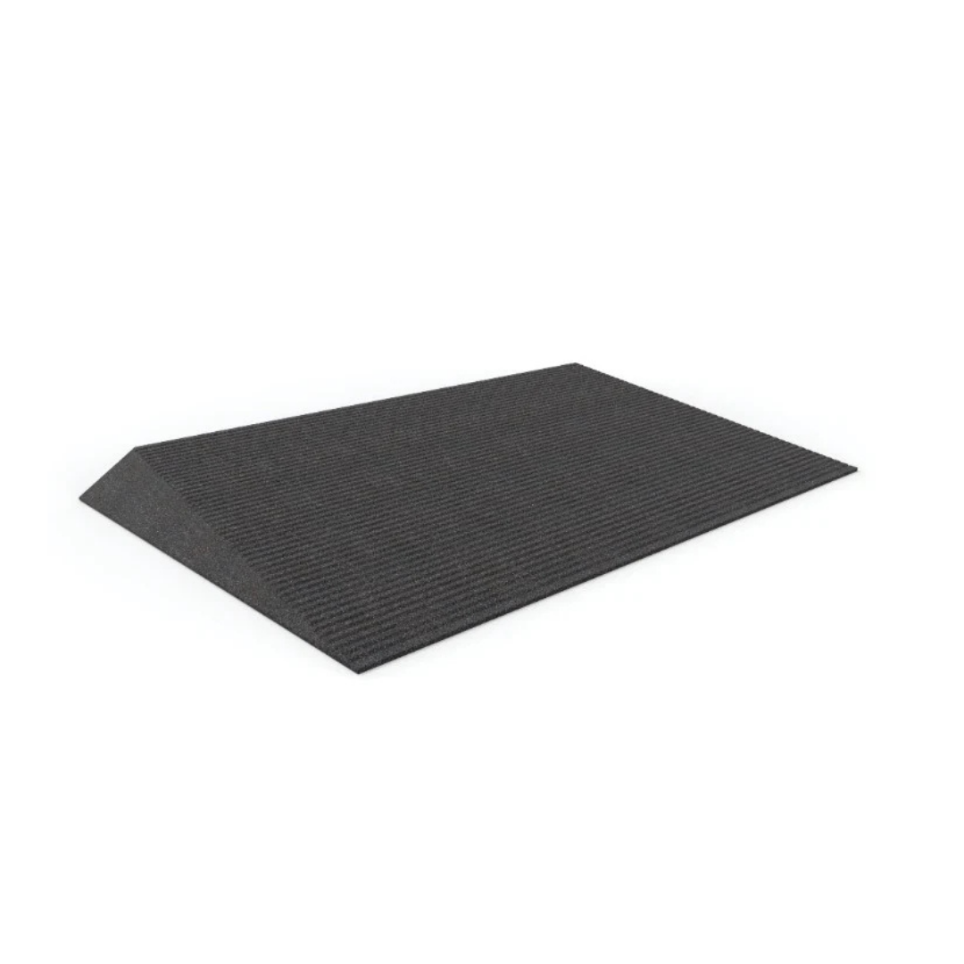 The EZ-Access TRANSITIONS® Angled Entry Welcome Mat is a black, ridged recycled rubber threshold ramp with a slip-resistant surface and gentle slope for easier wheelchair access over steps or doorways, shown on a plain white background.