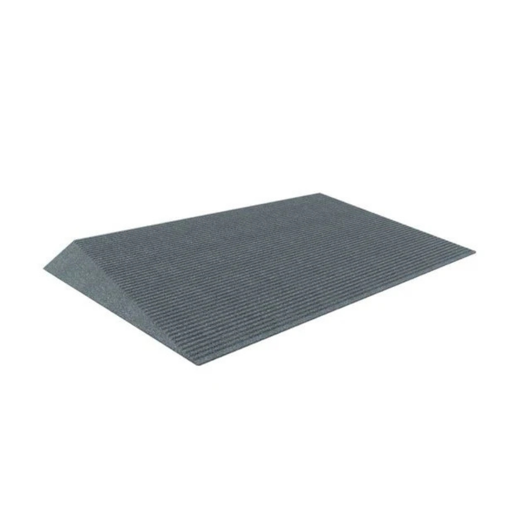 The EZ-Access TRANSITIONS® Angled Entry Welcome Mat is gray with a textured, slip-resistant surface and a gentle incline. Shown on a white background, it appears to be made of durable material.