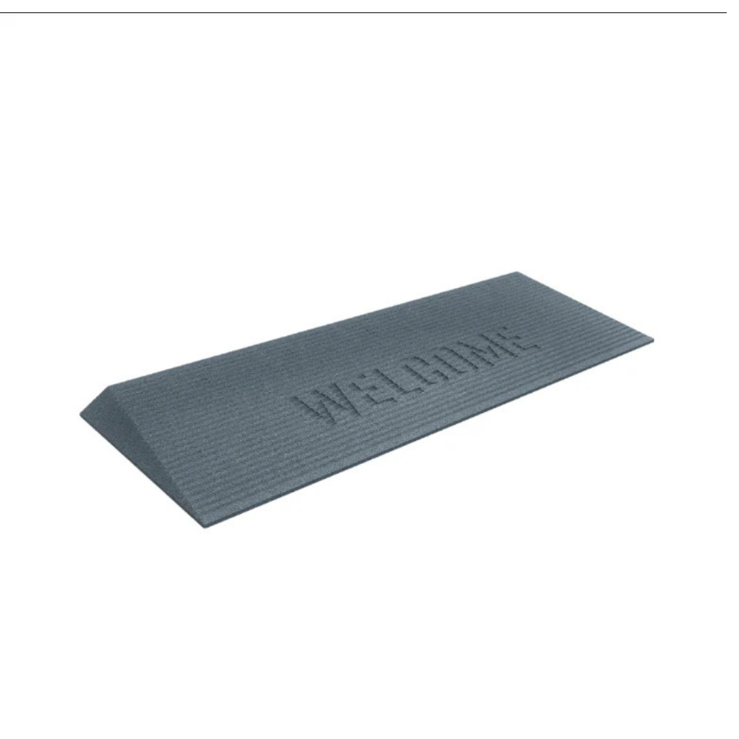 The EZ-Access TRANSITIONS® Angled Entry Welcome Mat is a gray, rectangular mat with a slip-resistant surface, WELCOME in uppercase letters, made from recycled rubber and shown on a plain white background.