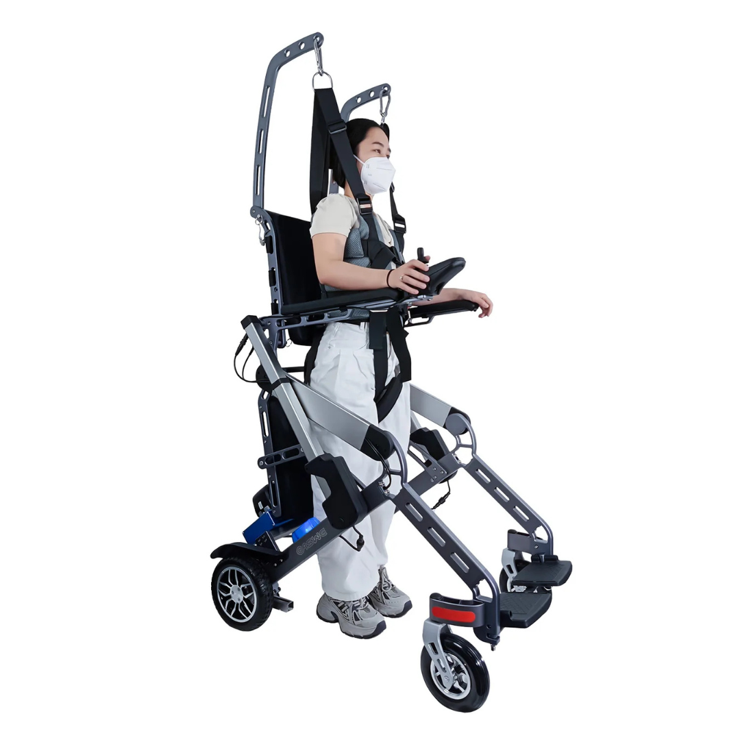 A masked individual uses the Easwe™ S10 Standing Electric Wheelchair for Rehabilitation Training, featuring support harnesses and footrests for upright mobility. The background is plain white.