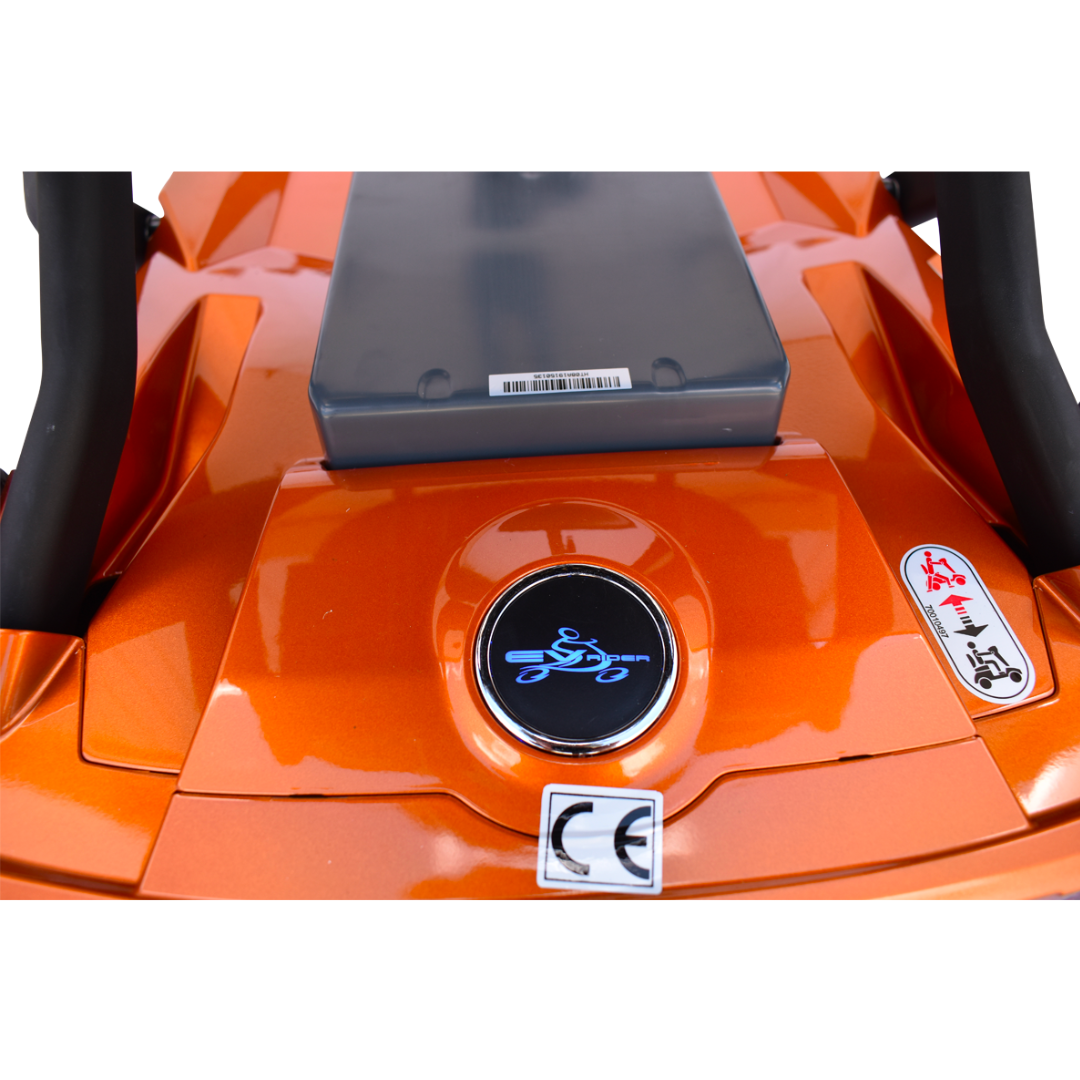 Close-up of the EV Rider Teqno Automatic Folding Portable Travel Scooter toy, featuring a rider logo, CE mark, a red front sticker, black handles, and a gray rectangular component on the front panel.