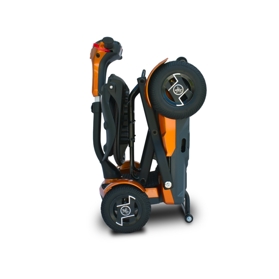 The EV Rider Teqno Automatic Folding Portable Travel Scooter, in compact orange and black, stands upright for easy transport or storage against a plain white background.