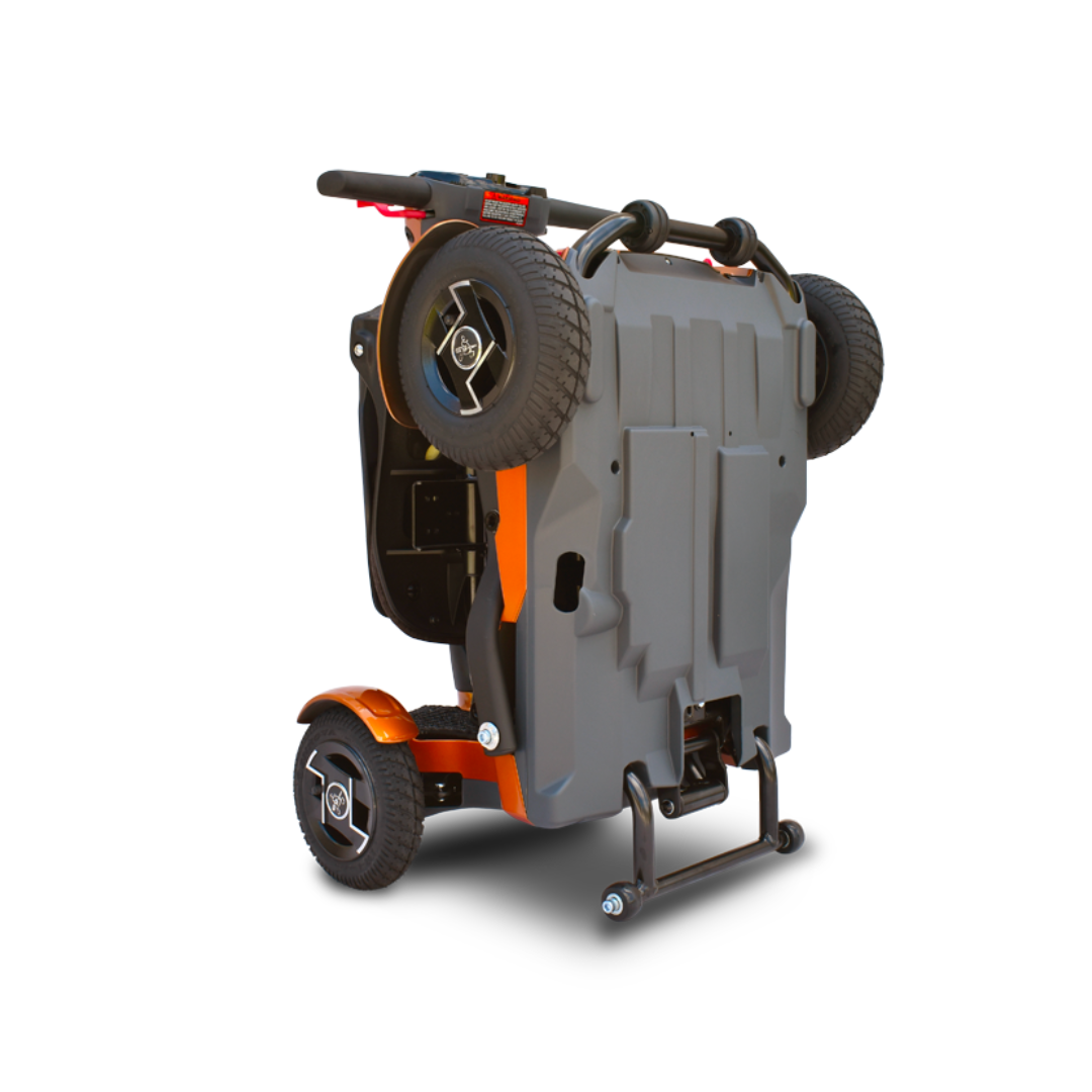 The EV Rider Teqno Automatic Folding Portable Travel Scooter is a compact, orange and black scooter with two large wheels, a top handlebar, and stands upright for easy storage and transport.