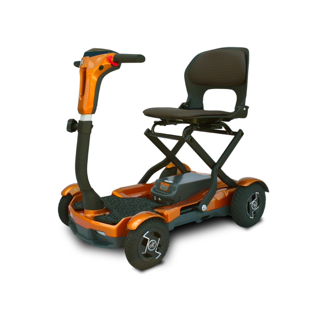 The EV Rider Teqno Automatic Folding Portable Travel Scooter is shown in orange with four wheels, a black padded seat featuring a backrest, and an easy-to-use control handlebar, displayed on a white background.