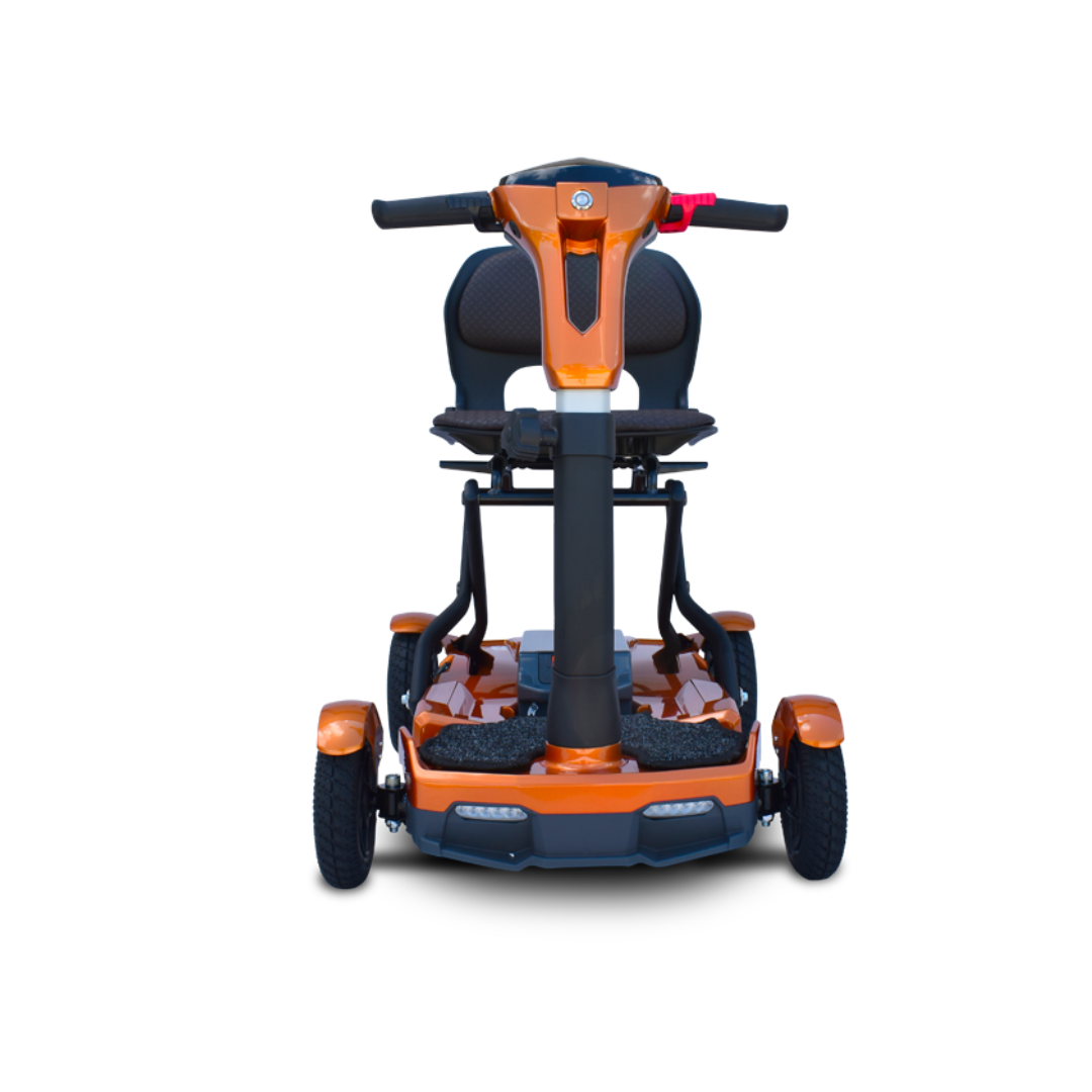 Front view of the EV Rider Teqno Automatic Folding Portable Travel Scooter in orange and black, featuring a padded seat, handlebar, four wheels, and footrests, shown on a white background.