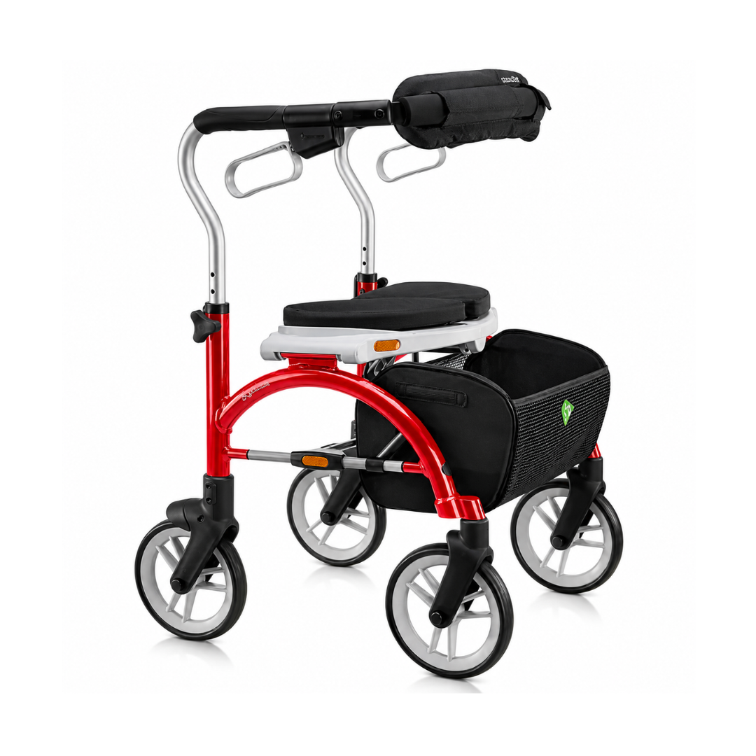 The Evolution Xpresso Lite Carbon Fiber Rollator features an ultra-light red frame, padded seat, adjustable handles, large black-and-grey wheels, and a storage bag beneath the seat for superior mobility assistance.