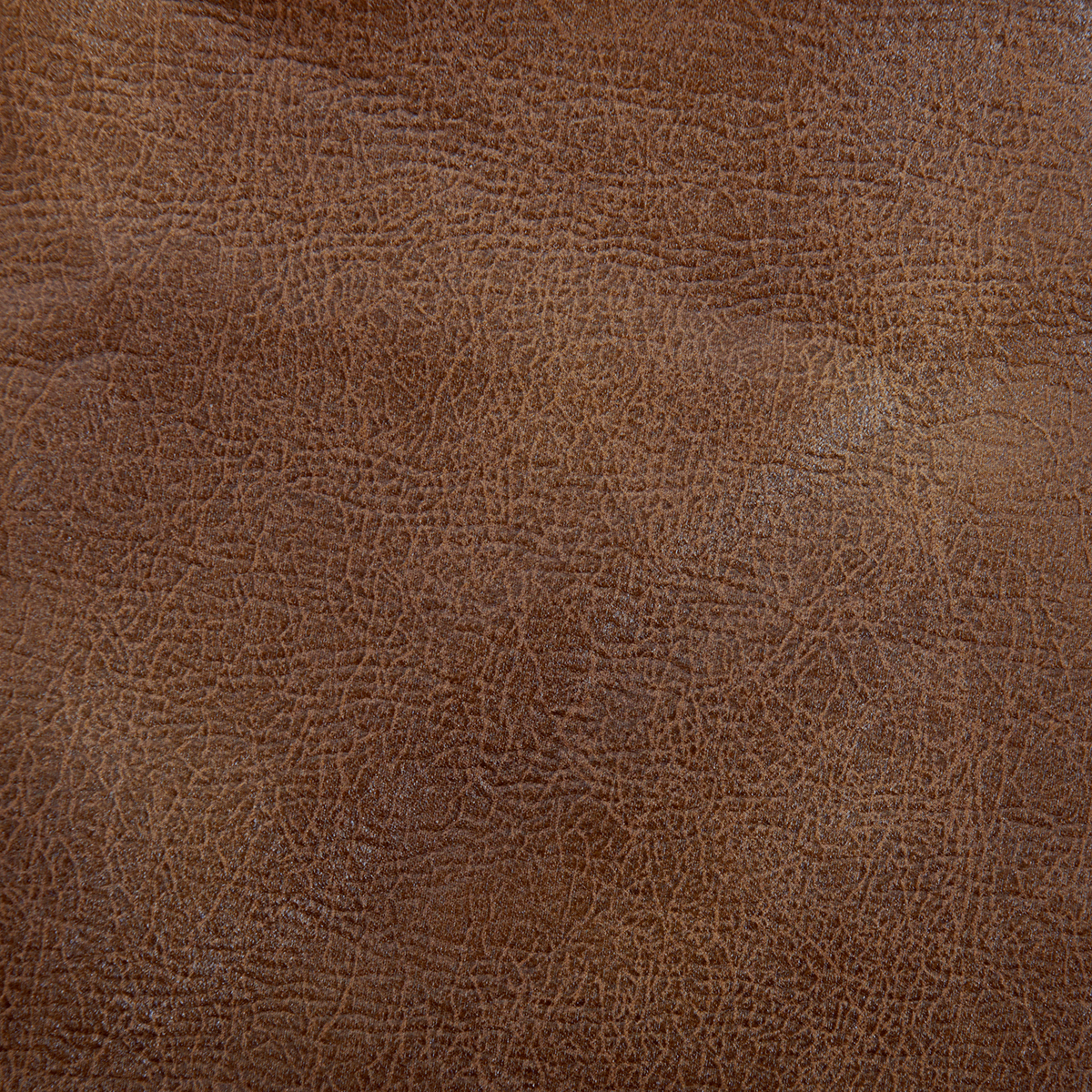 Close-up of the brown leather texture on the Golden Tech PR766 Relaxer MaxiComfort Recliner with Lift Assist - Small, highlighting natural grain patterns, subtle color variations, and fine lines. It offers MaxiComfort Positioning through Programmable AutoDrive Hand Control.