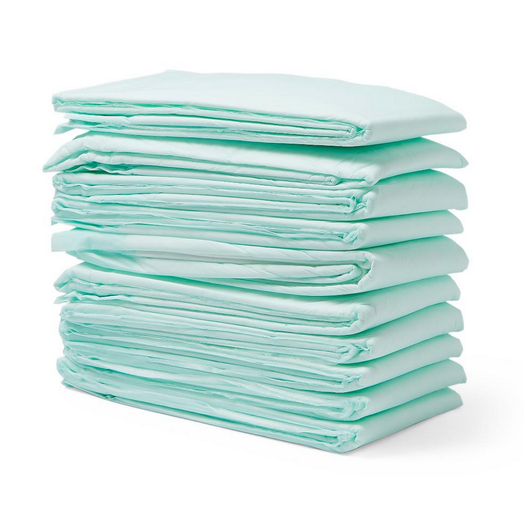 A stack of Medline FitRight Underpads, in light green with waterproof backing for added protection, is neatly folded and arranged on a white background. Designed for moderate or heavy absorbency.