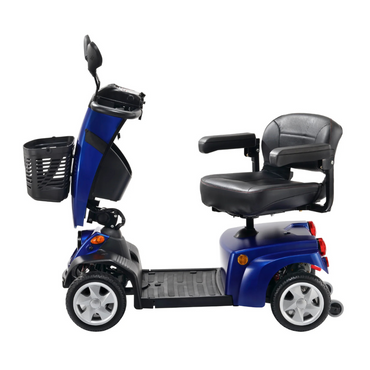 The FreeRider FR1 City Heavy Duty Mobility Scooter is a blue and black, 4-wheel motorized scooter with a front basket, padded seat with armrests, and handlebar control panel—perfect for city mobility. Side view shown on a white background.