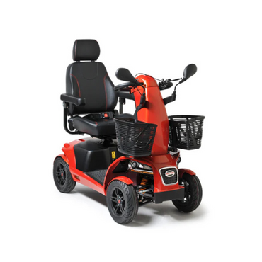The FreeRider FR1 Terrain Heavy Duty Mobility Scooter is a red, four-wheel scooter with a padded seat, armrests, headrest, handlebars, and two front black baskets. Its double wishbone suspension delivers smoother rides on any surface.