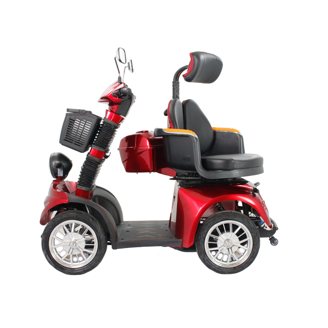 The GIO Tron Pro, a red 4-wheel mobility scooter with smart seat technology, features a black seat, headrest, armrests, footrest platform, front basket, and rearview mirrors. It is shown in profile on a white background.