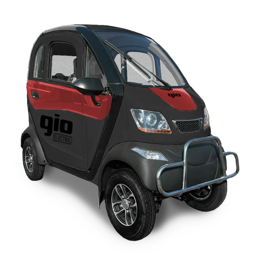 The GIO Golf Fully Enclosed Mobility Scooter, designed for urban travel, is a compact three-wheeled electric vehicle in sleek black and red. It features large windows, a front bull bar, and the gio electric logo on its side.