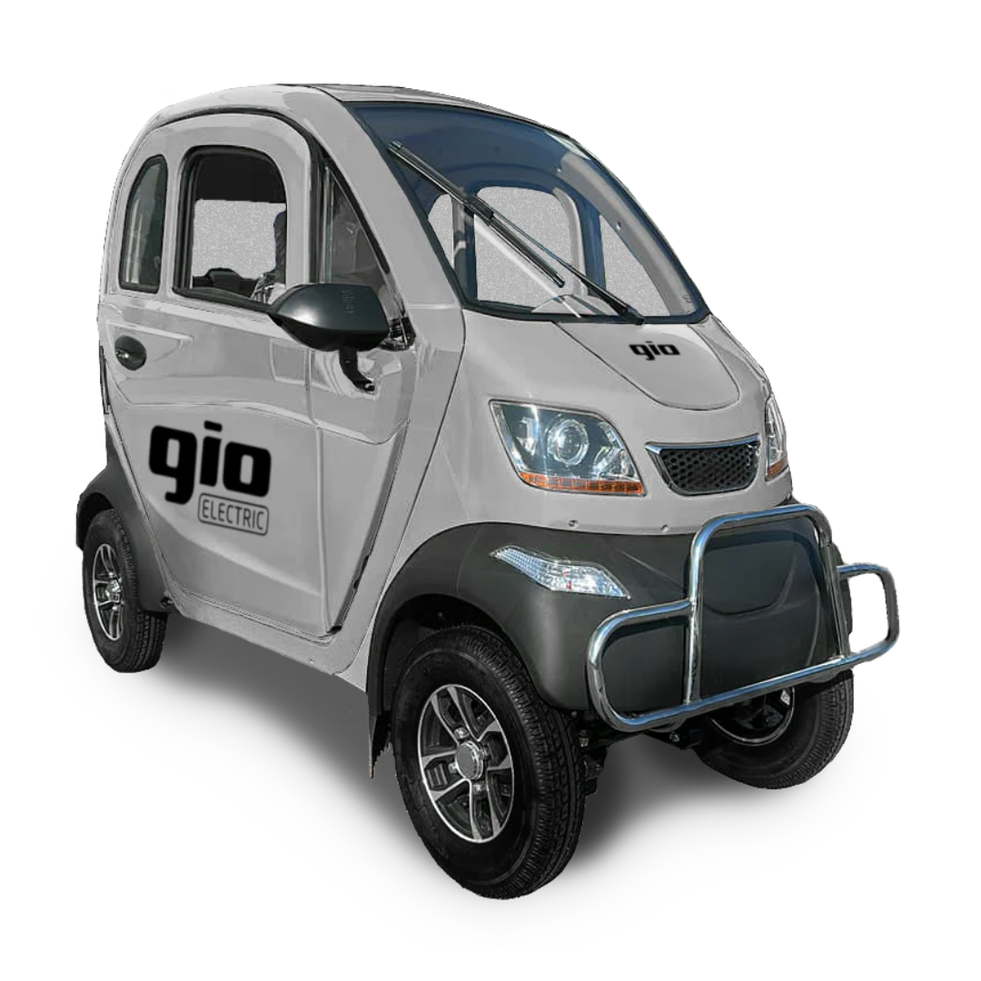 The compact white GIO Golf Fully Enclosed Mobility Scooter features a sleek, scooter-like design with a silver grille and two doors. Small wheels and logos enhance its charm against a white background, showcasing its effortless style.