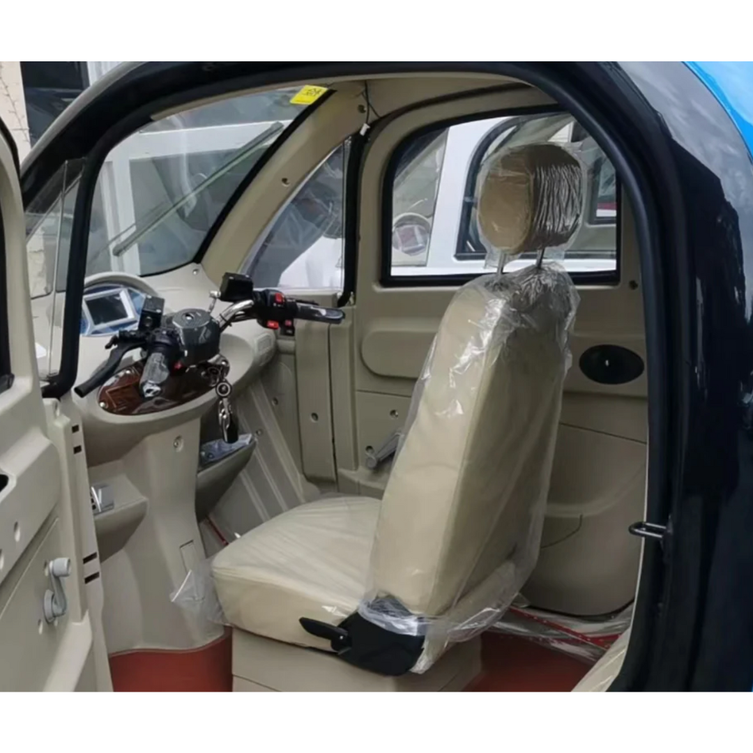 Interior view of the luxurious GIO Golf Fully Enclosed Mobility Scooter showcasing a single beige plastic-wrapped seat, steering mechanism, and digital display. The open door reveals its sleek design, intuitive controls, heater, and cooling fan.