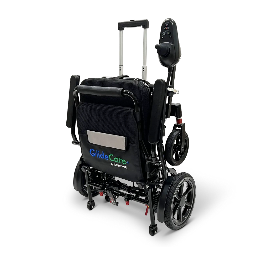 The Glide Care G-5 PRO Lightweight Foldable Electric Wheelchair by ComfyGO is shown in black, folded, with large rear wheels and a joystick control on the armrest—ideal for travel, ease, and mobility.