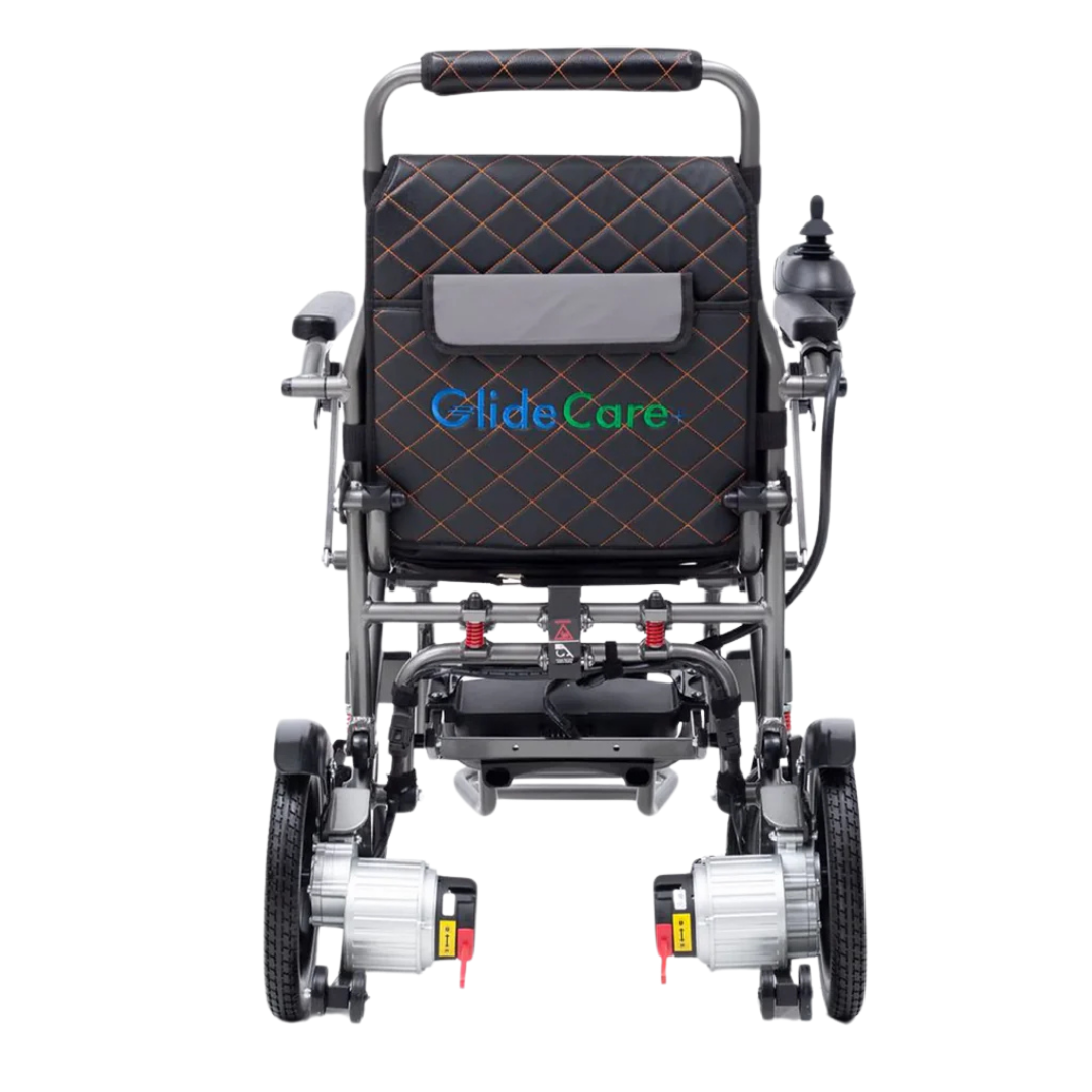 Rear view of the Glide Care G-5 Lightweight Foldable Electric Wheelchair, featuring a quilted black backrest, side joystick, visible batteries, motors on the lower back wheels, and discreet GlideCare branding.