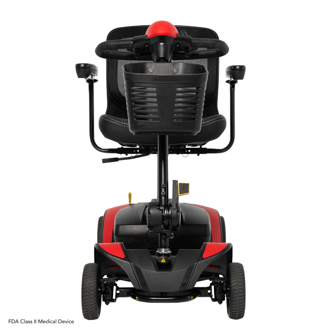 Rear view of a Pride Mobility Go Go Elite Traveller® 2 Platinum Scooter with four wheels, padded seat, armrests, and handlebars. The mobility scooter is displayed against a white background.