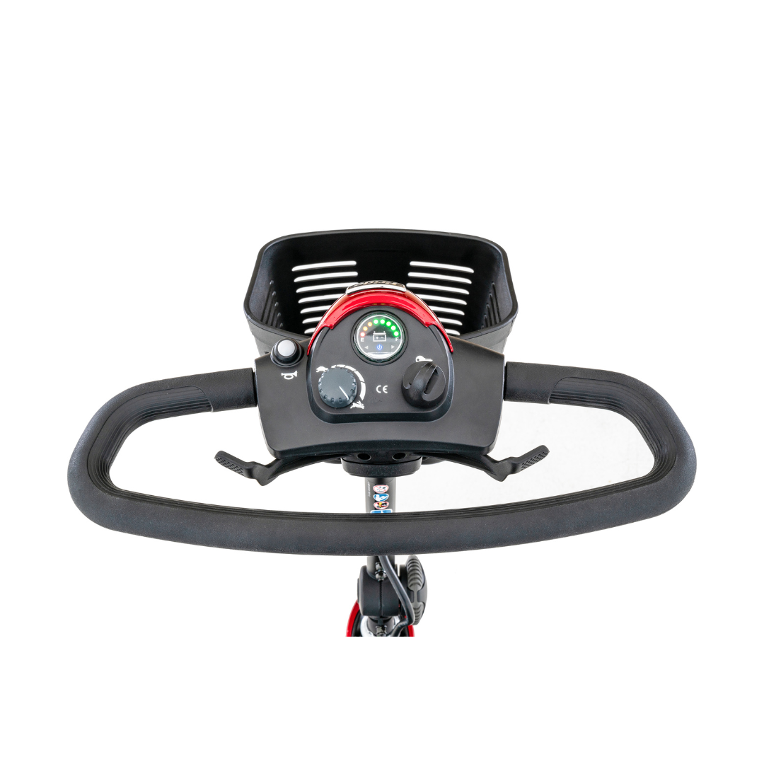 A close-up of the Pride Mobility Go Go® Elite Traveller 3-Wheel Mobility Scooters control panel displays the steering handle, speed dial, button, and digital display. Its modular, lightweight design stands out against a white background, highlighting its travel-friendly functionality.
