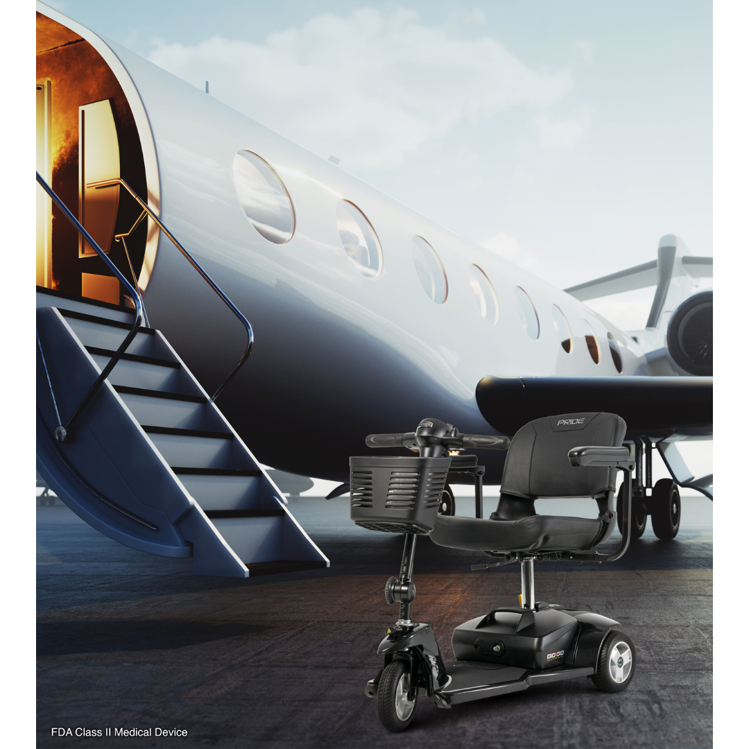 A Pride Mobility Go Go® Ultra X 3-Wheel Scooter is parked on a runway before a private jet, highlighting its portable design. Featuring a black seat, handlebars, and basket, alongside the jets lowered stairs, it seamlessly combines luxury with accessibility.