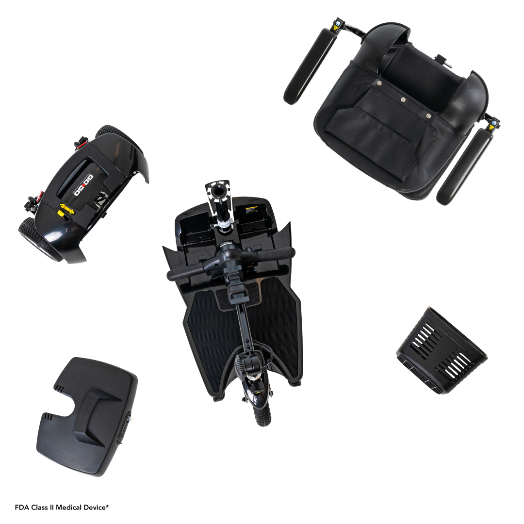 Disassembled parts of a Pride Mobility Go Go® Ultra X 3-Wheel Scooter are neatly arranged on a white background, displaying the seat, wheels, and base from above. Their design is clear, with the FDA Class II Medical Device label at the bottom left.