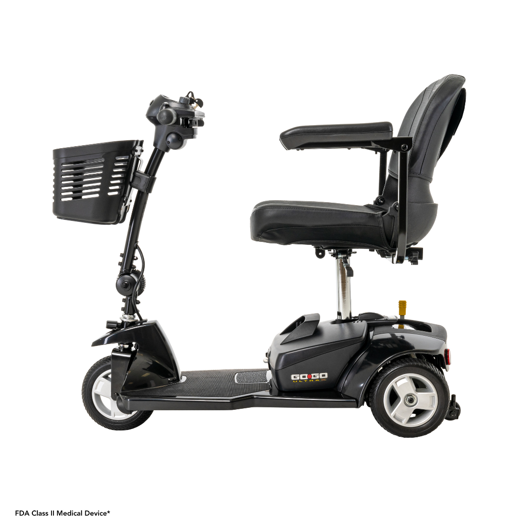 The Pride Mobility Go Go® Ultra X 3-Wheel Scooter is a black mobility scooter with a padded seat, handlebar with control panel, front storage basket, and footrest. Designed for versatility and economy-class use, its perfect for both indoor and outdoor settings.