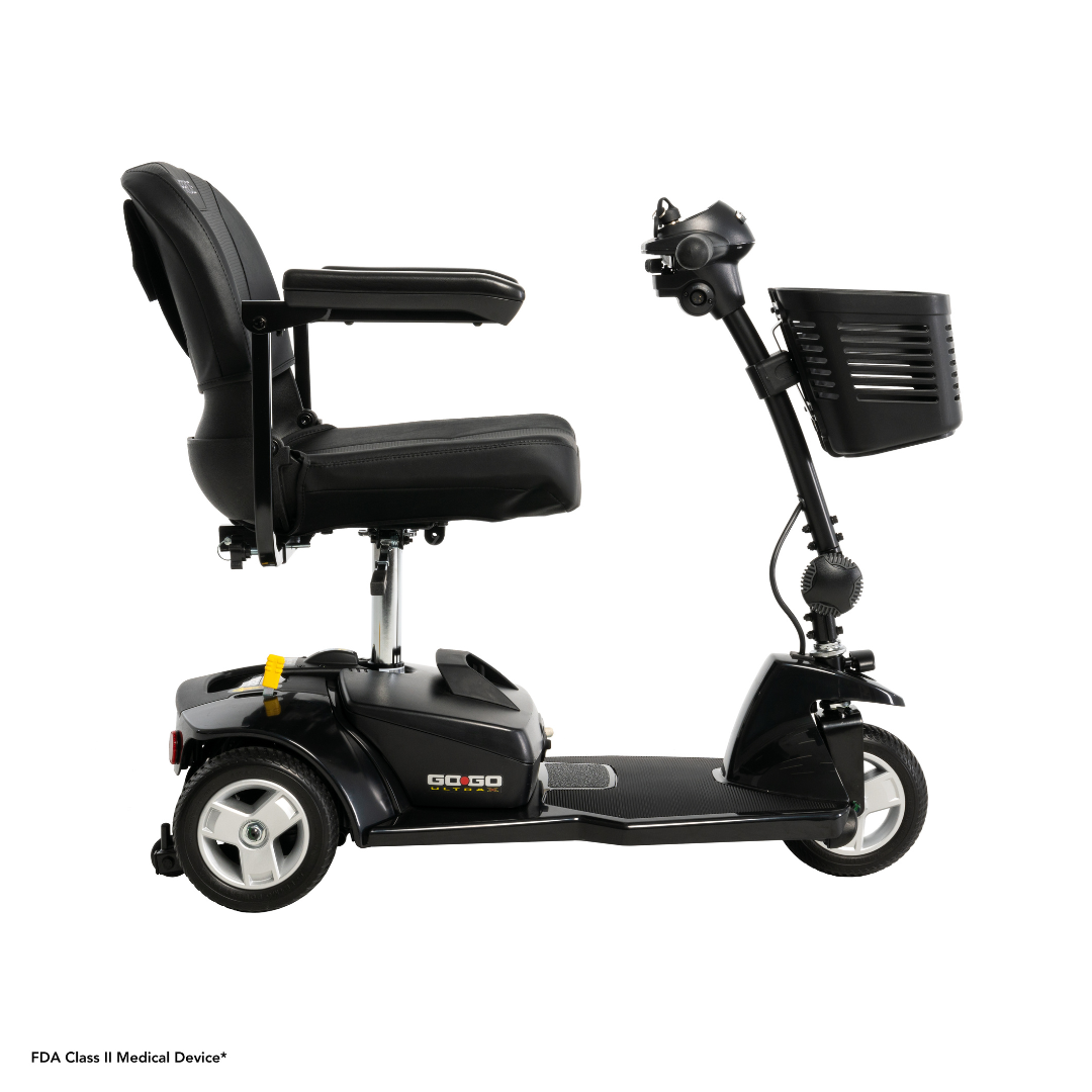The Pride Mobility Go Go® Ultra X 3-Wheel Scooter, shown from the side, features a cushioned seat with armrests, a front basket, and three wheels for stability in a portable economy design ideal for those on the move.