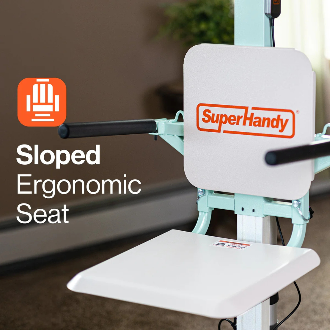 A white SuperHandy GoRise FC - Bariatric Electric Floor to Chair Lift with black armrests is attached to a vertical support pole indoors for mobility assistance. “Sloped Ergonomic Seat” text appears beside a seated figure icon on the left.