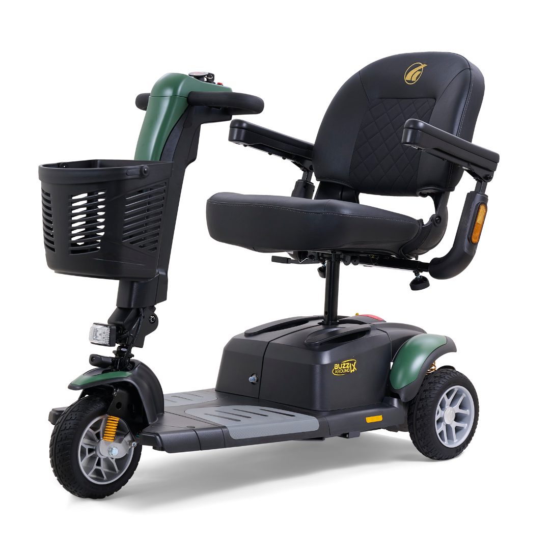 The Golden Buzzaround LX GB119 - Heavy Duty 3 Wheel Portable Mobility Scooter features a stylish black and green design with a comfortable padded seat, armrests, and a convenient front basket. This luxury three-wheeler from Golden Technologies combines easy-to-use steering handles with an exquisite balance of style and functionality for personal transportation.