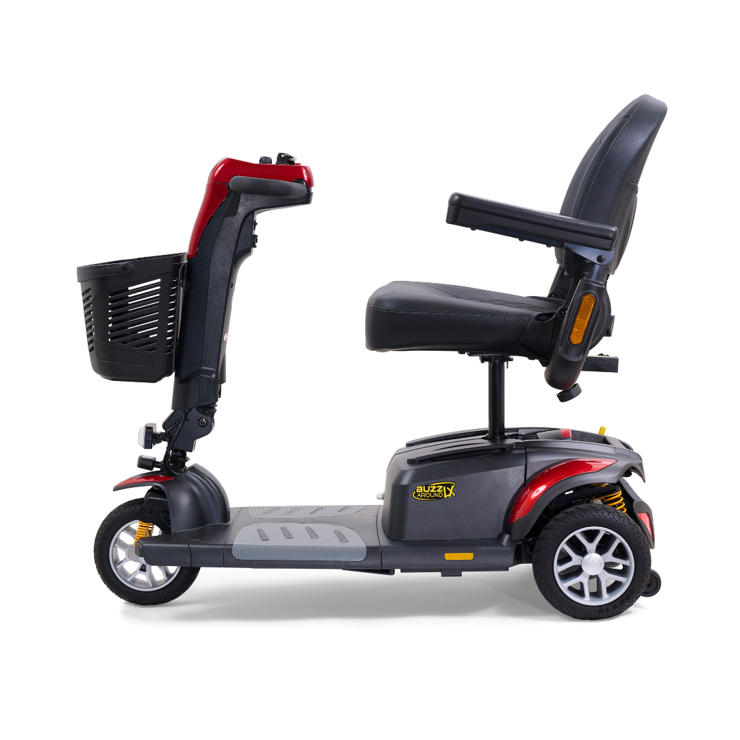 Side view of a red and black luxury Golden Buzzaround LX GB119 scooter, featuring a comfortable seat, backrest, and front basket. This heavy-duty 3-wheel portable mobility scooter by Golden Technologies showcases a sleek design that enhances mobility with style.