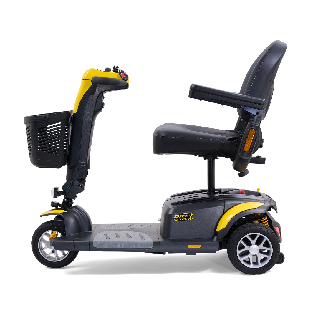 Side view of the Golden Buzzaround LX GB119, a black and yellow heavy-duty portable mobility scooter. It includes a comfortable seat with armrests and a front basket, featuring three wheels ideal for luxury personal transportation.