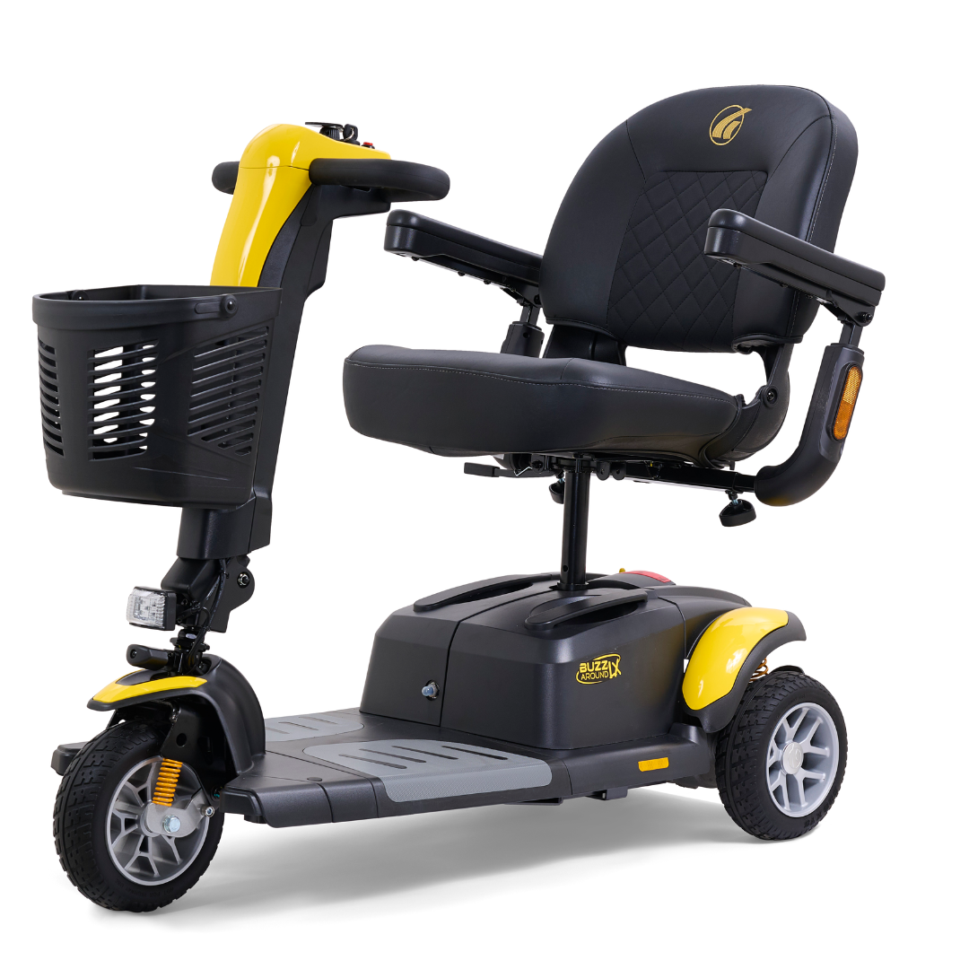 Set against a white backdrop, the Golden Buzzaround LX GB119—Heavy Duty 3 Wheel Portable Mobility Scooter by Golden Technologies showcases a sleek black and yellow design. It comes with a padded seat, armrests, front basket, handlebar controls, and offers a stable, compact build for improved portability.