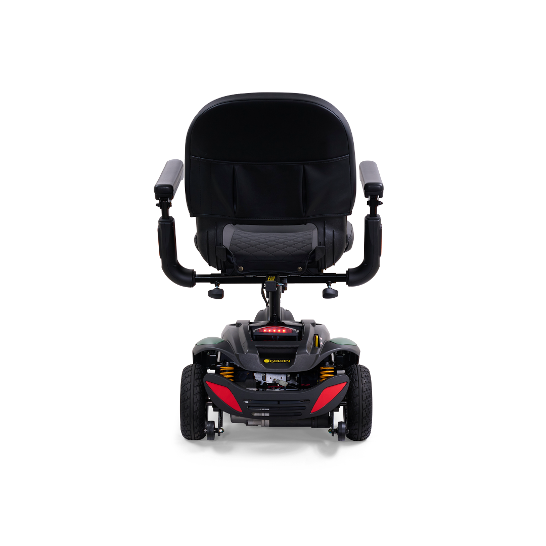 The Golden Buzzaround LX GB119 is a heavy-duty 3-wheel portable mobility scooter that, when viewed from the front, boasts a padded seat and armrests. Its straightforward design is enhanced by red accents, blending elegance with convenience.