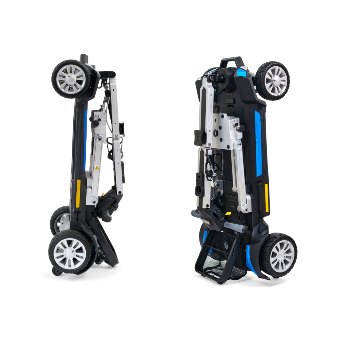 In two views, the folded Golden Technologies Portable Buzzaround GB120 Carry-On Travel Scooter showcases its compact and ultra-portable design with stylish silver and blue accents. The scooter features visible wheels and a modern appearance, equipped with a fold-flat mechanism and a lithium-ion battery for easy storage or transportation.