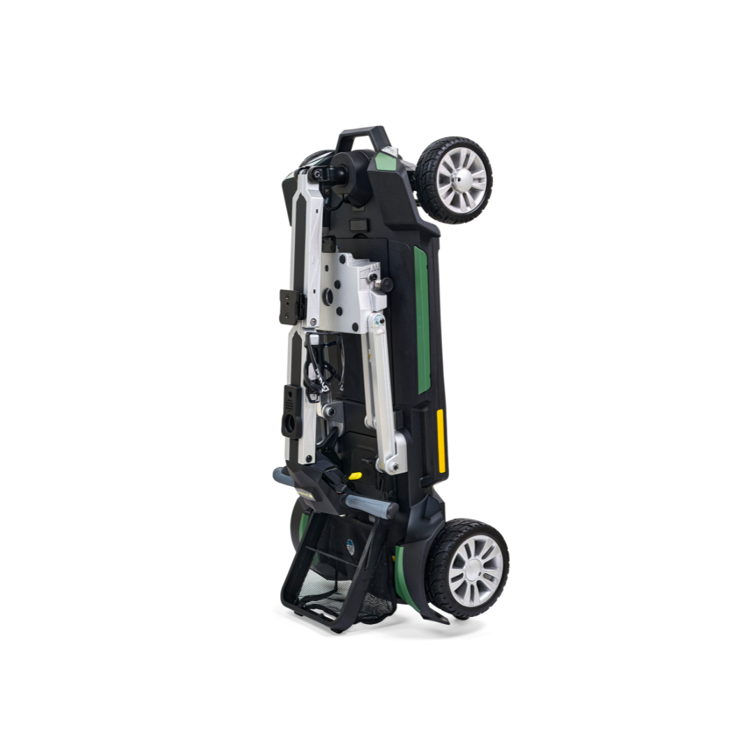 The Golden Technologies Portable Buzzaround GB120 Carry-On Travel Scooter is a fold-flat electric scooter that stands upright to highlight its compact design. It features a sleek black and green color scheme, sturdy wheels, and a metallic frame with an ultra-portable build, making it ideal for easy storage. Powered by a lithium-ion battery, it's perfect for on-the-go convenience.