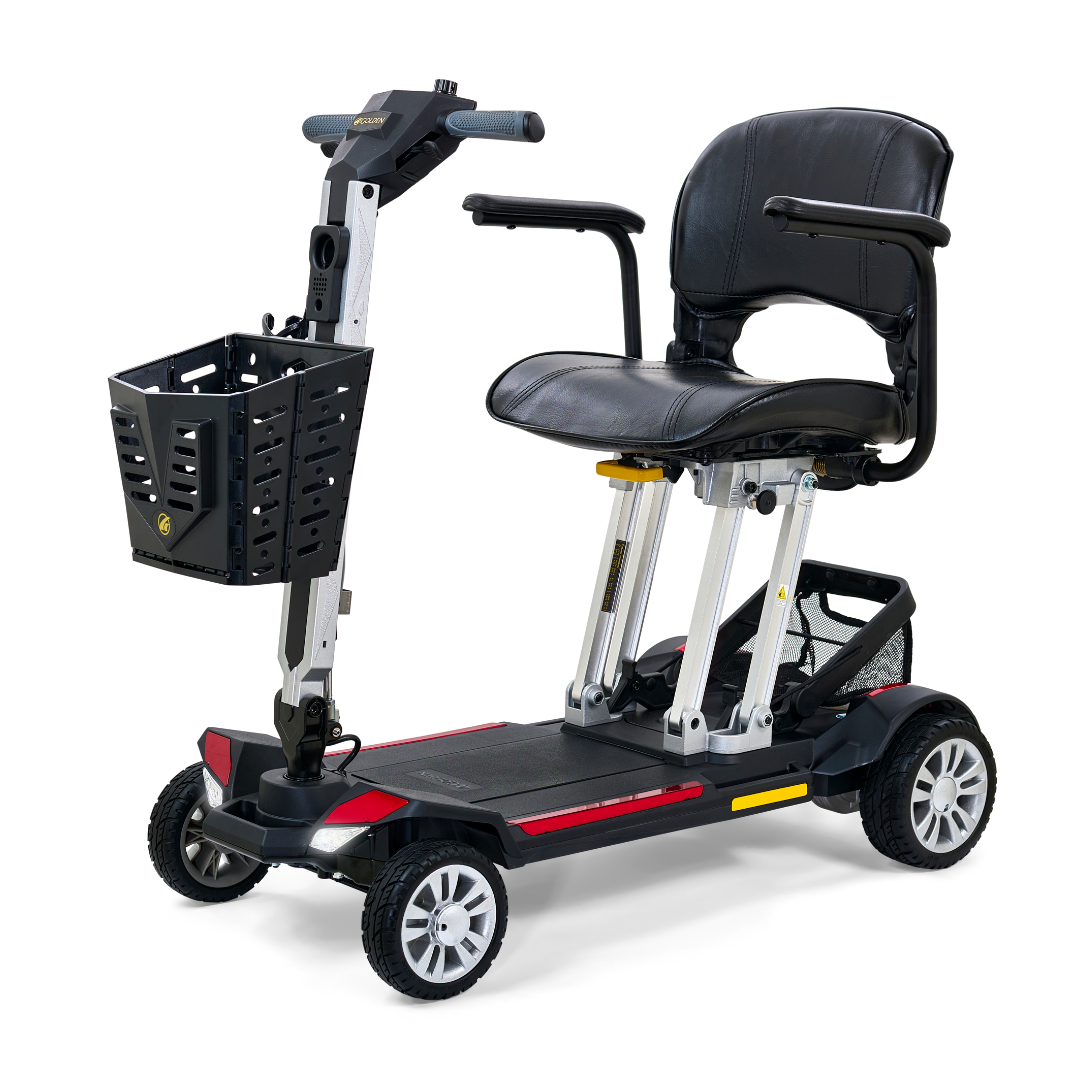The Golden Technologies Portable Buzzaround GB120 Carry-On Travel Scooter is a compact, ultra-portable mobility solution featuring a black seat with armrests, a steering handle, and a front basket. Its sleek design includes four wheels with red detailing accents, and the fold-flat scooter is powered by a lithium-ion battery for ultimate convenience.