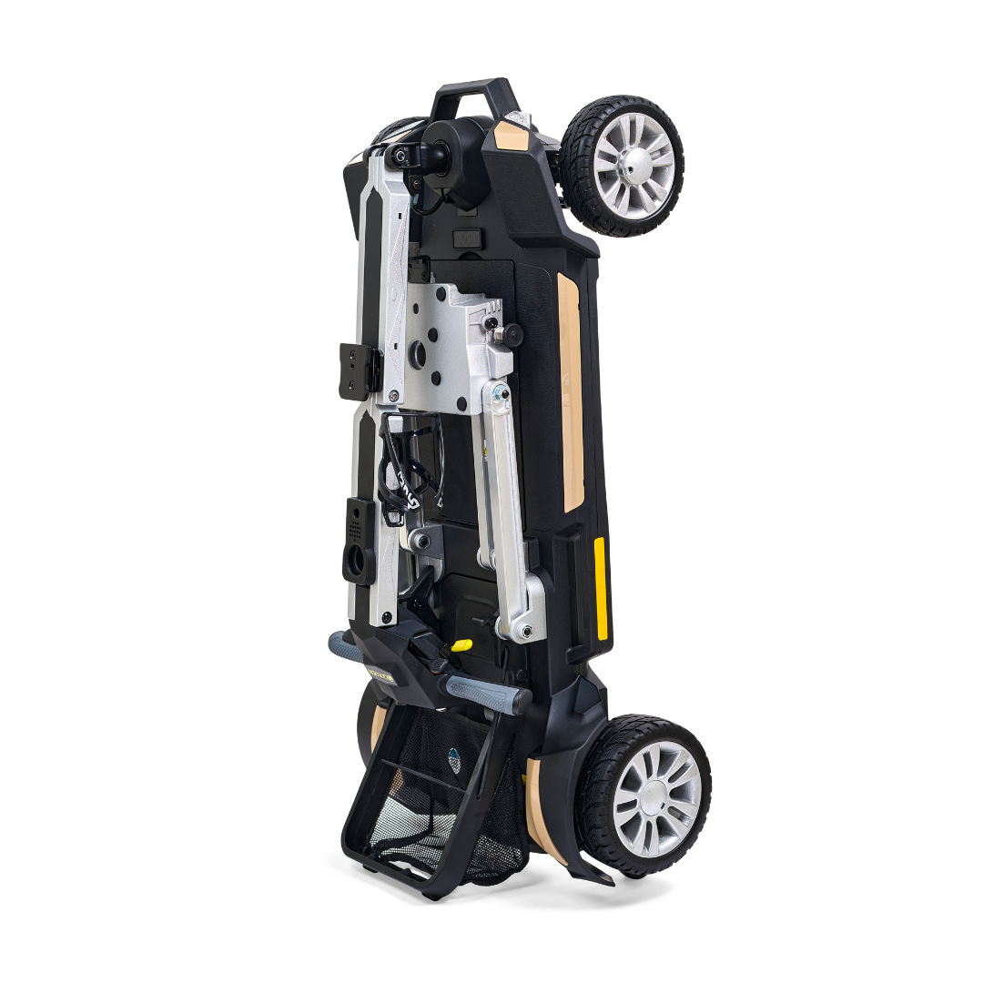An image of a compact black and silver Golden Technologies Portable Buzzaround GB120 Carry-On Travel Scooter standing upright on its two wheels. The scooter features metallic components, a handle, and visible wheels, displayed against a white background.