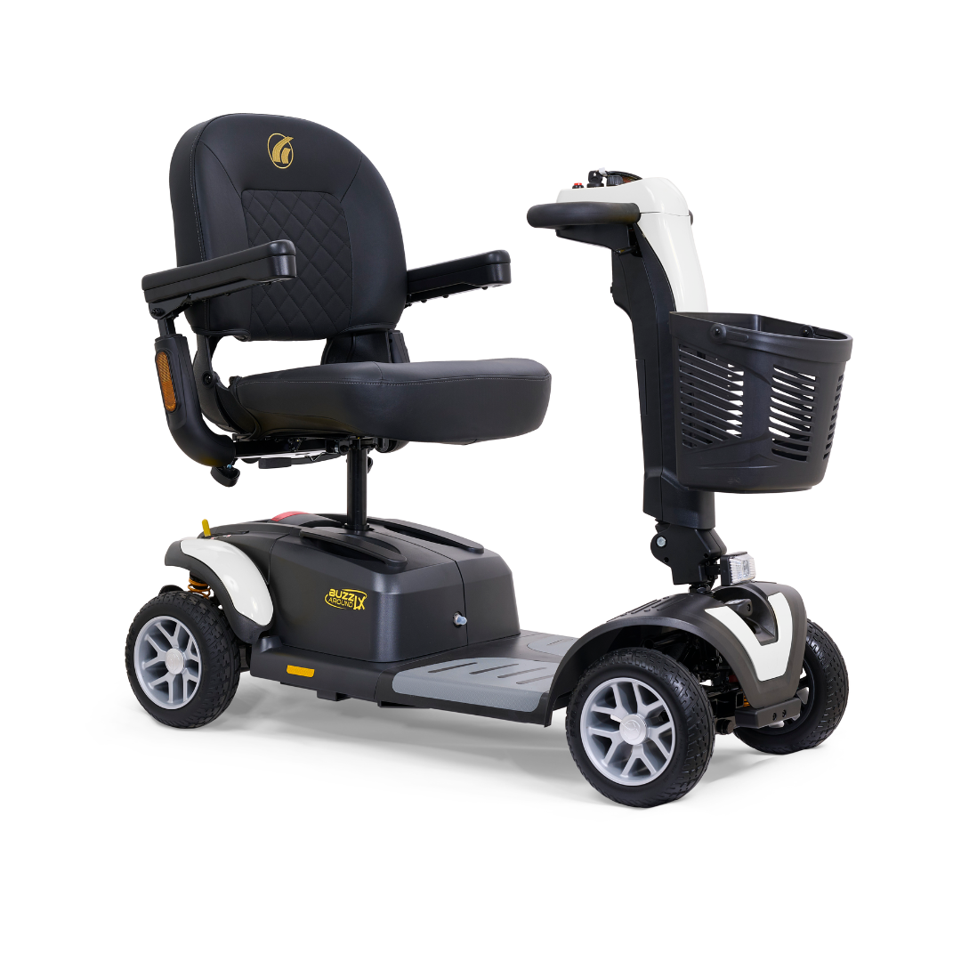 The Golden Buzzaround LX GB149 is a heavy-duty, four-wheel portable mobility scooter in black and white. It features a comfortable seat with armrests, an adjustable tiller, and includes a front basket for added convenience. Designed for accessibility and easy transport, it is perfect for those on the go.