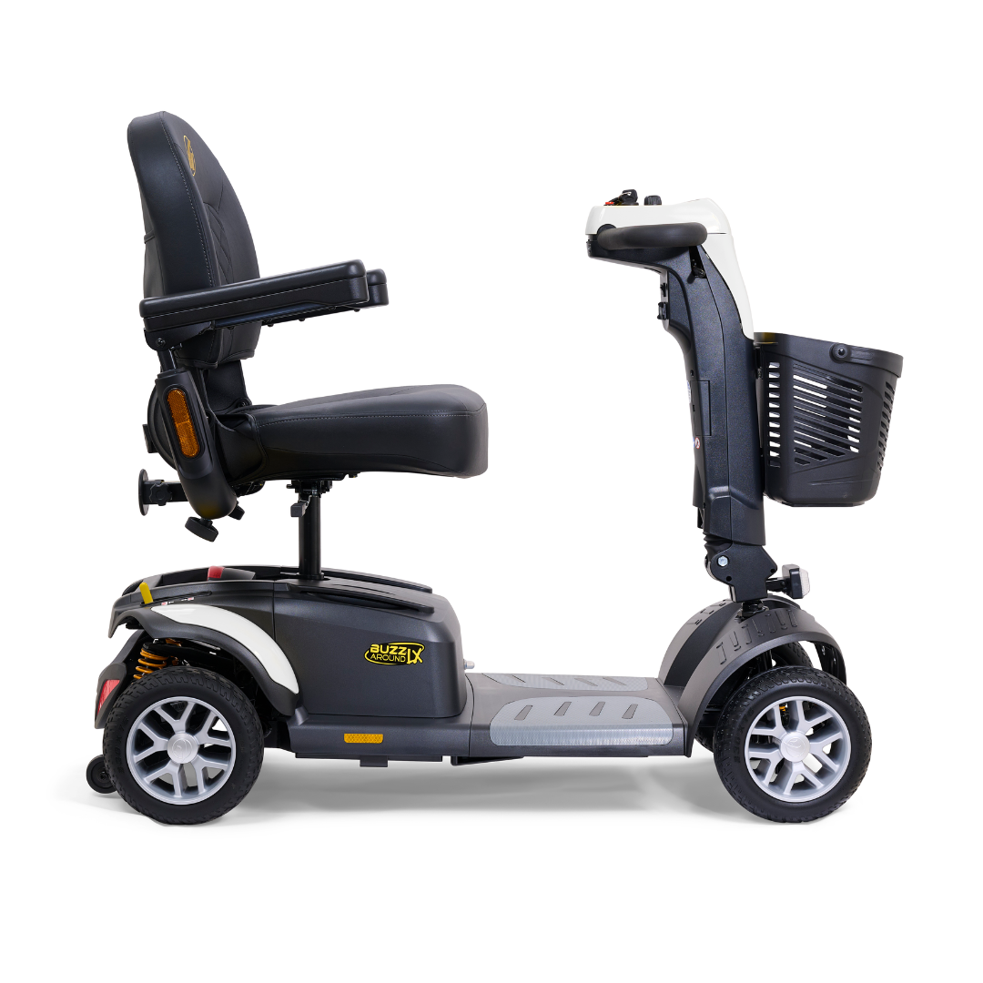 Experience seamless travel with the Golden Buzzaround LX GB149, a heavy-duty 4-wheel portable mobility scooter. It offers comfortable rides with a cushioned seat, armrests, and a front basket. The sleek black and gray design with yellow accents is complemented by small wheels and an adjustable tiller for smooth personal transportation.
