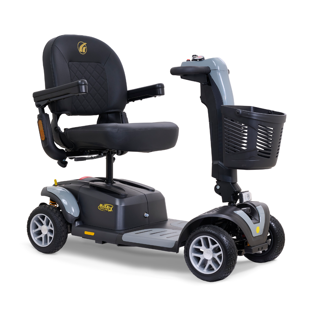 The Golden Buzzaround LX GB149 is a heavy-duty, four-wheeled portable mobility scooter equipped with a black seat, armrests, and a compact front basket. It features an adjustable tiller and showcases a grey and black color scheme, ergonomic handlebars, and robust wheels for seamless transportation and improved mobility.