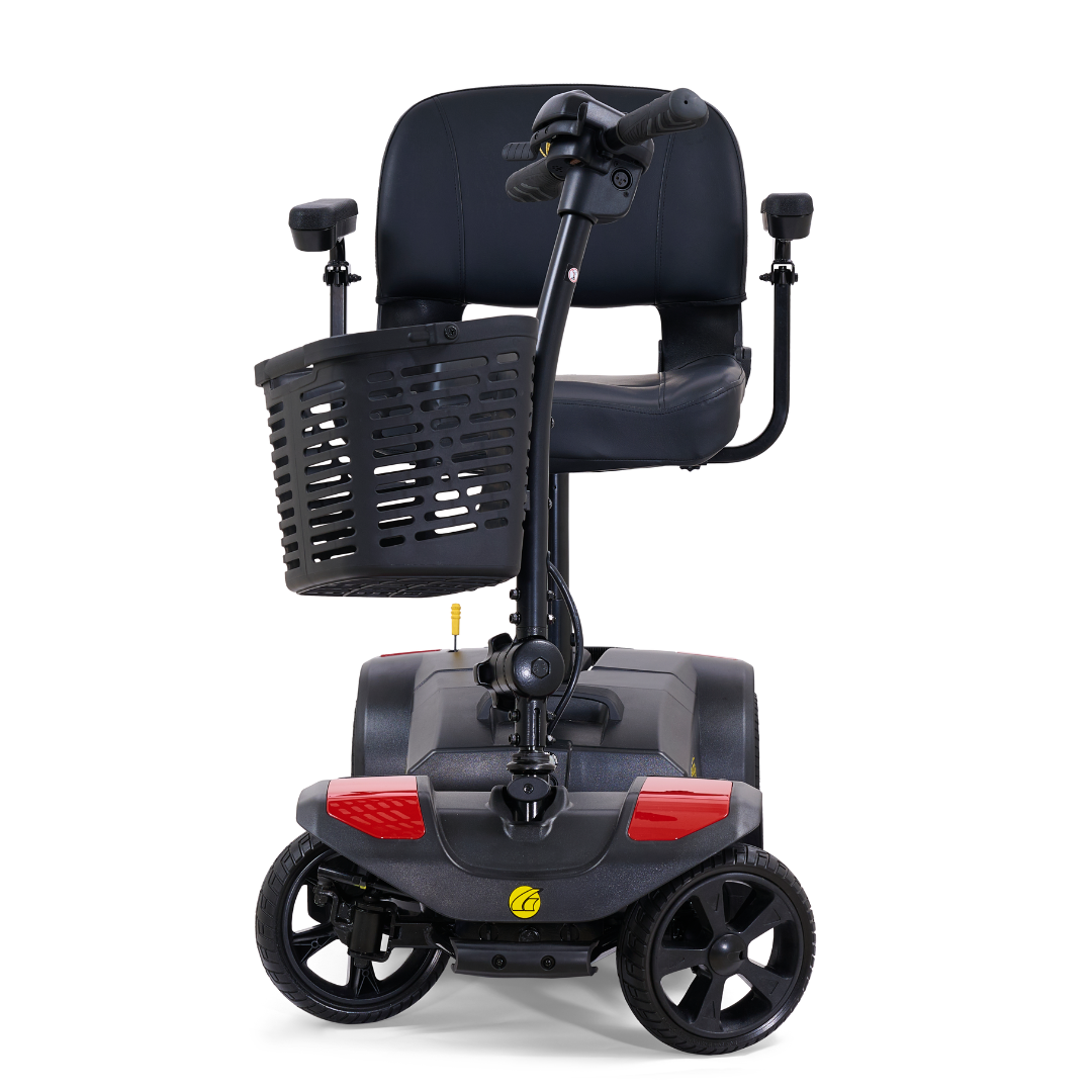 The Golden Tech GB108 Buzzaround LT 4-Wheel Mobility Scooter, shown from the front on a white background, features a compact black design with a lightweight stadium-style seat, cushioned armrests, front basket, and supports up to 300 lbs.