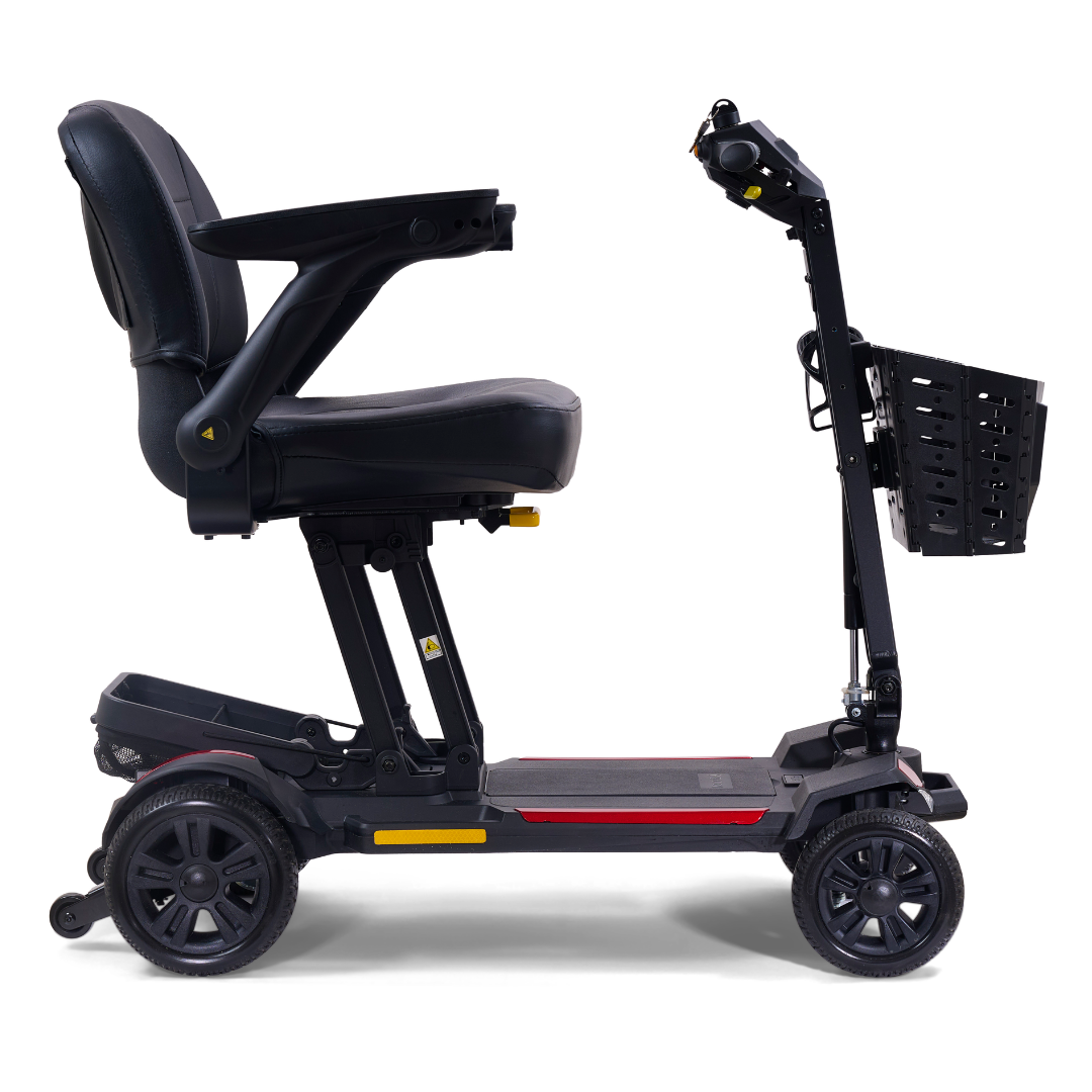 Side view of the Golden Buzzaround GB220 CarryOn HD Travel Scooter, a compact, sturdy 4-wheel model with a padded seat, armrests, handlebar controls, front basket, and a 400 lb weight capacity.