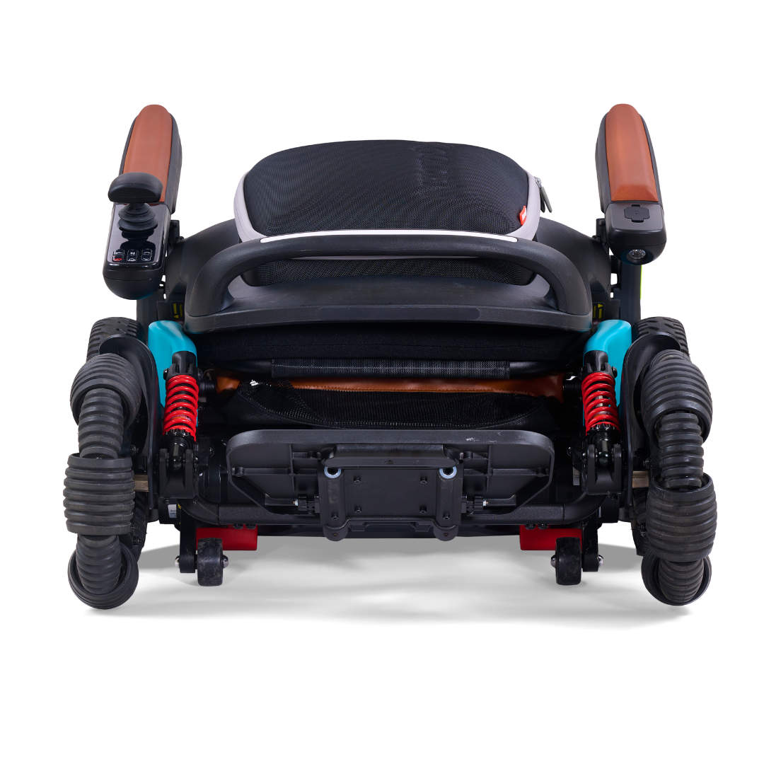 Front view of the Golden Tech Ally Pro Smart All-Terrain Power Wheelchair features omni-directional treaded tires, shock absorbers, a cushioned seat with brown armrests, and advanced robotics. The joystick on the right armrest offers seamless navigation.