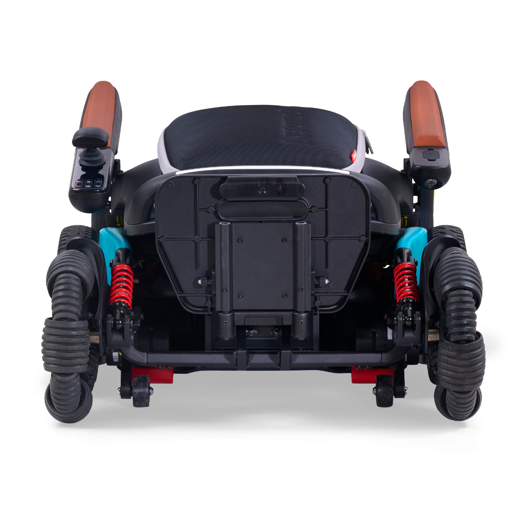 The Golden Tech Ally Pro, a smart all-terrain power wheelchair in black, features four large ribbed wheels with red suspension springs. It has advanced robotics, brown armrests, a padded black seat with blue accents—all set against a white background for a sleek rear view.
