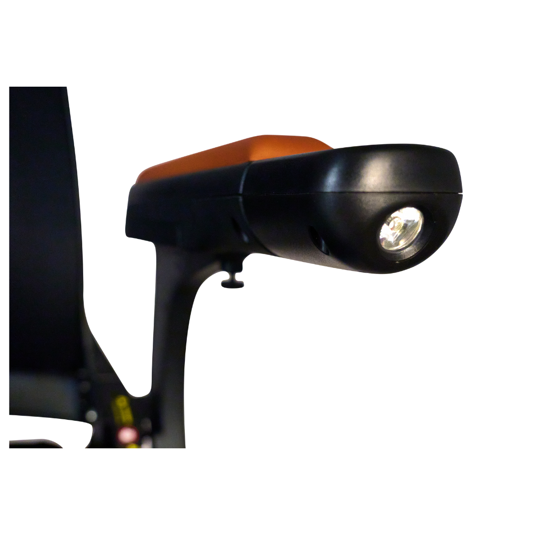 Close-up of the Golden Tech Ally Pro Smart All-Terrain Power Wheelchairs advanced APP-controlled headlight, with a sleek black casing and illuminated bulb against a white background, highlighting its innovative design inspired by robotics technology.
