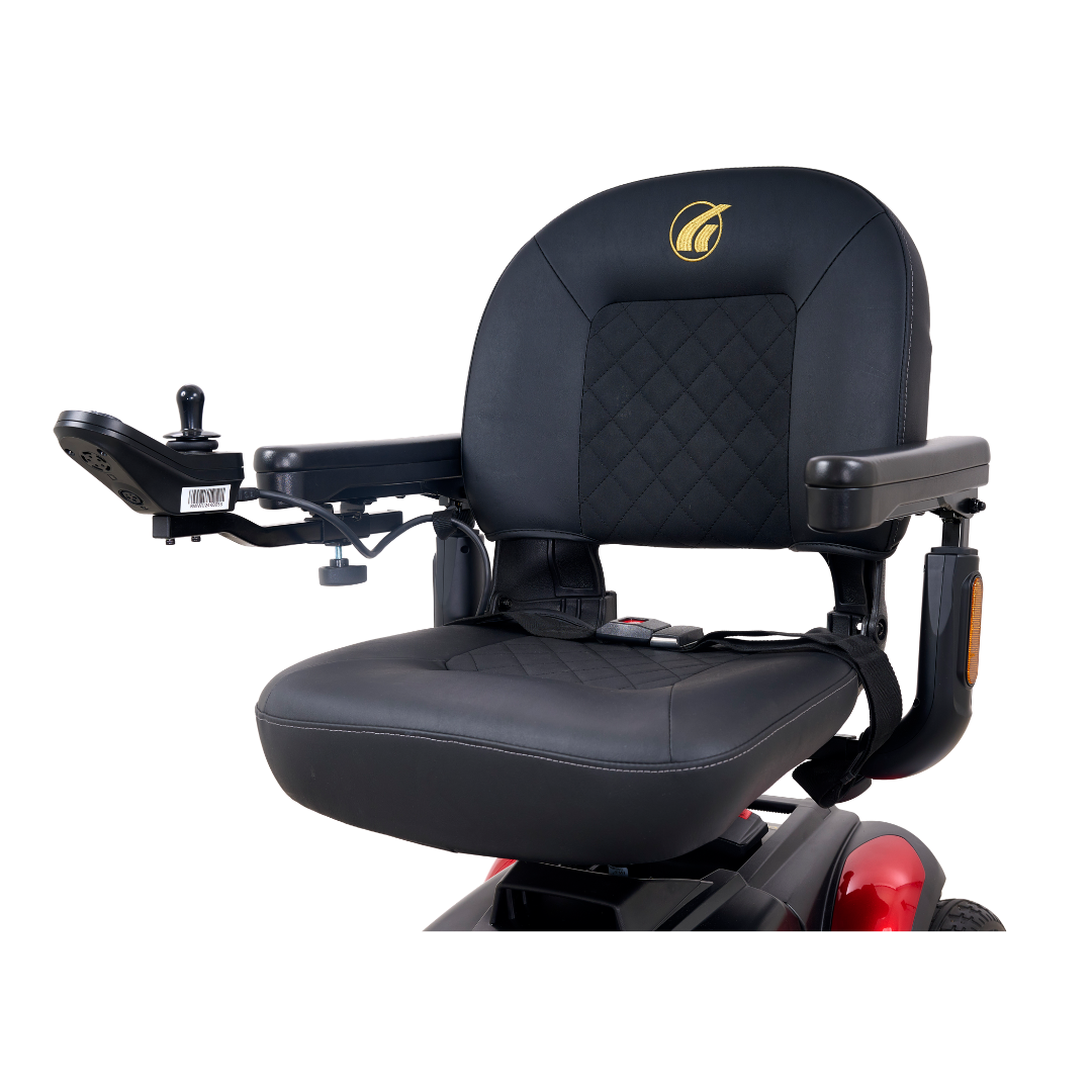 Close-up of the Golden Tech BuzzAbout Portable Power Wheelchair seat featuring padded armrests, a left-arm joystick, diamond-pattern stitching, and a gold leaf logo—highlighting BuzzAbout quality.