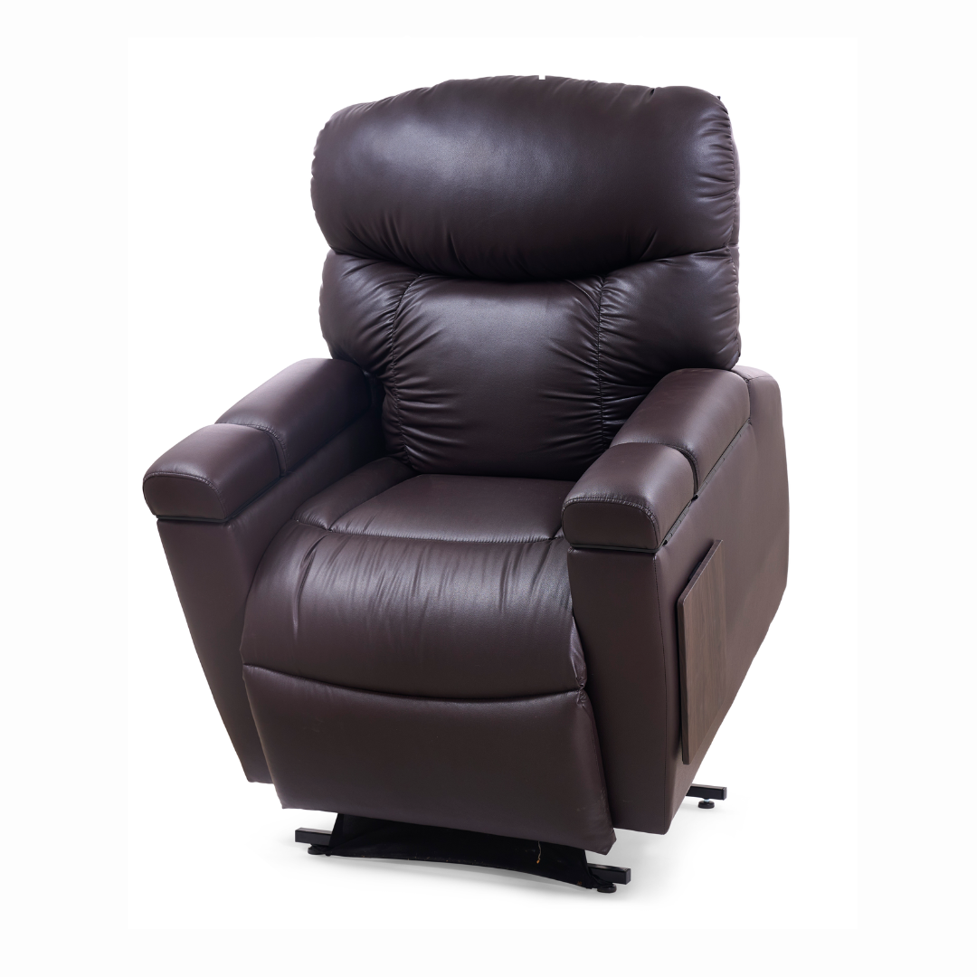 A Golden Cloud+ PR511 Recliner with Lift Assist - Medium Wide is depicted against a white backdrop. The dark brown leather chair includes cushioned armrests, a plush backrest, and features a 4-Zone Comfort Zone with an AutoDrive hand control mechanism at the base.