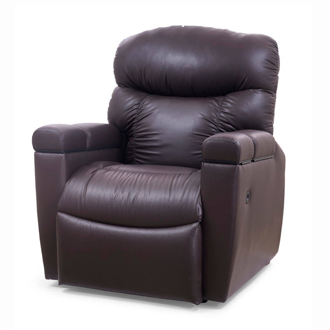 The Golden Cloud+ PR511 Recliner with Lift Assist - Medium Wide comes in plush dark brown leather, featuring cushioned armrests and a tufted backrest. Its 4-Zone Comfort Zone and AutoDrive hand control deliver elevated relaxation against a plain white backdrop.